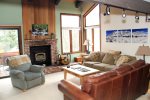 Mammoth Condo Rental Sunrise 47 - Well furnished living room with woodburning stove